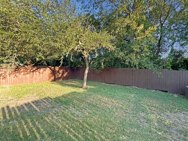 Building Photo - Northeast 3/2 with New Bedroom Floors & Covered Patio