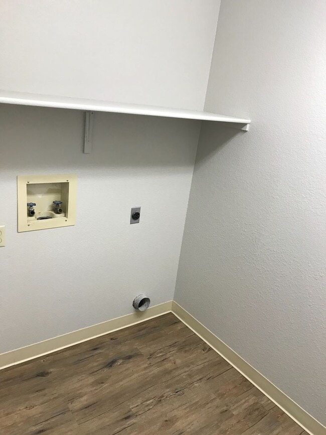 Building Photo - Coming in March – Beautiful Single-Story Home with Dual Living Spaces & Fenced Yard