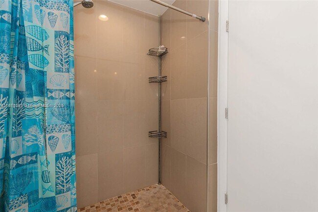 Building Photo - 6039 Collins Ave