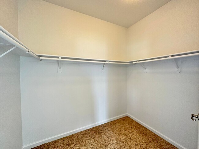 Building Photo - 4 bedrooms, 2 1/2 Baths with a 3 Car Garag...