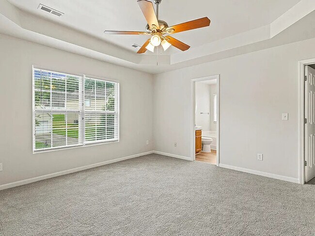 Building Photo - Earn Wealth While Leasing - Like a Homeown...
