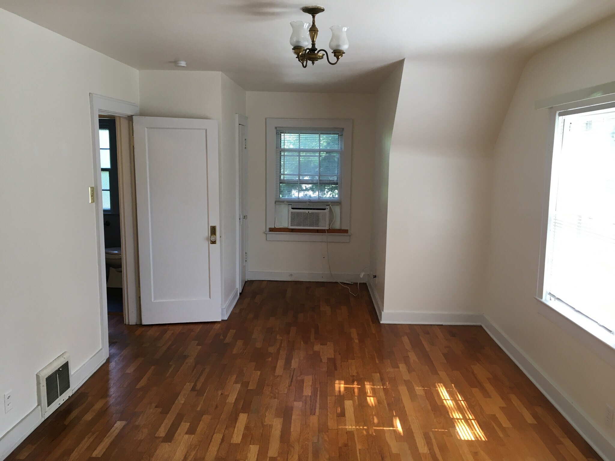 Second floor bedroom, has window air conditioning. - 1304 Dunklin St