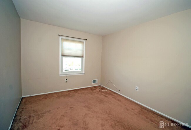 Building Photo - 7 Gardenia Ct