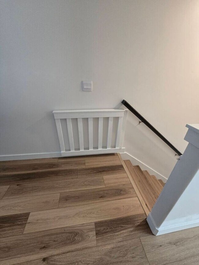 Building Photo - Nearly New, Well Appointed Modern Townhouse w 2 car attached garage