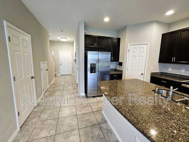 Building Photo - 7115 Grand Elm Dr