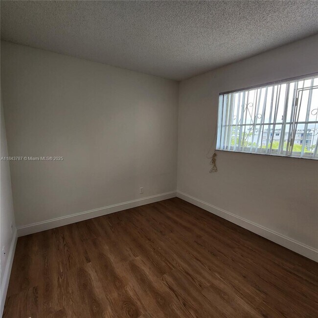 Building Photo - 8550 N Sherman Cir