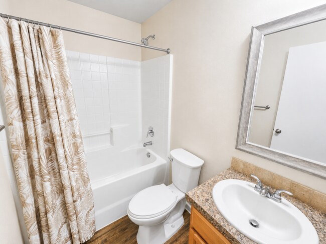 Building Photo - Easy-Living 3 Bed, 2 Bath Home with Double Garage, Pool Access & Private Courtyard