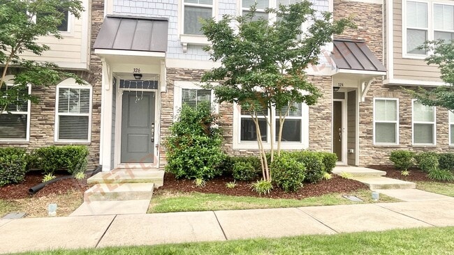 Building Photo - 3 Story Townhome 3 Bedrooms Rear Entry 2 Car Attached Garage with 1st Floor Bedroom, Community Po...