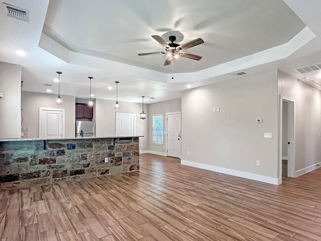Building Photo - Elegant Stone-Front Home on 1 Acre in Natalia