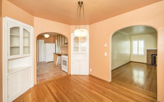 Building Photo - Charming Spanish Style Cottage with Incredible Deck- Gardener's Delight!