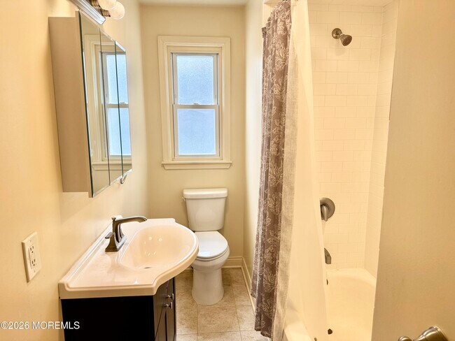 Building Photo - 320 8th Ave