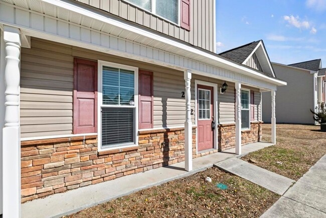 Building Photo - End Unit with Lots of Upgrades!