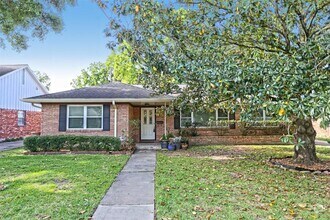 Building Photo - Wonderful mid century one story home, rece...