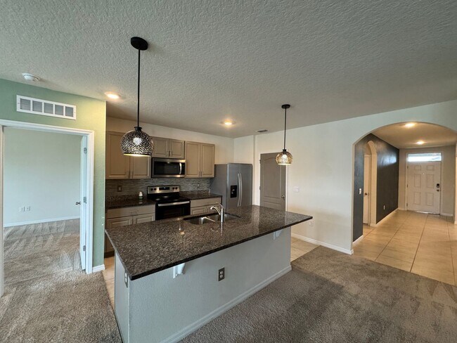 Building Photo - 3BD/2BA Modern Florida Home Living Reimagined — Solar-Powered Elegance Near I-95 in Edgewater! FU...
