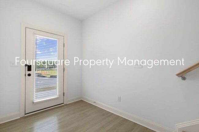 Building Photo - Spacious Townhome with Entry-Level Guest Suite, Washer/ Dryer Included, 2nd floor Balcony & 2-Car...