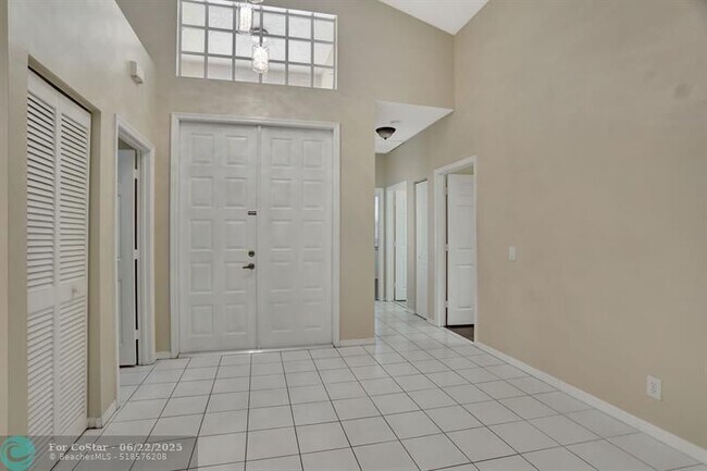 Building Photo - 6455 NW 78th Dr