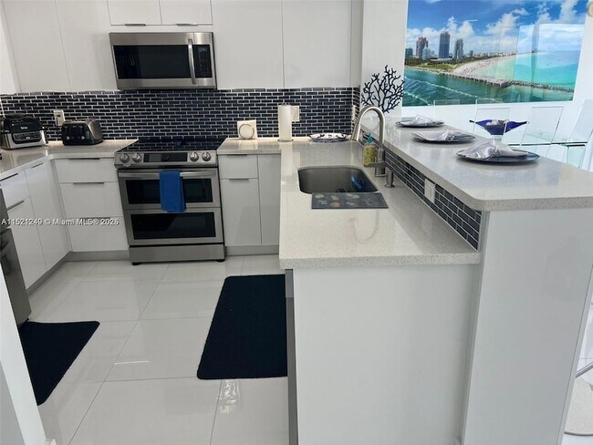 Building Photo - 16699 Collins Ave