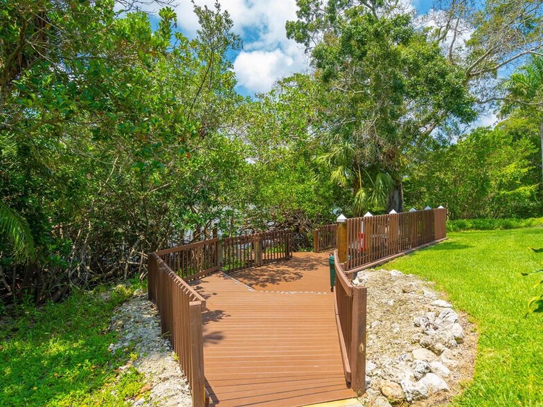 boardwalk to BBQ and dock - 850 S Tamiami Trl