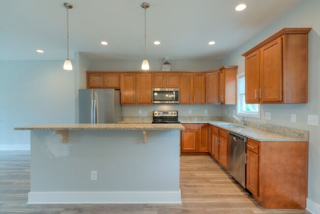 Building Photo - Private Bedroom in a Shared Two-Bedroom In Uptown Village