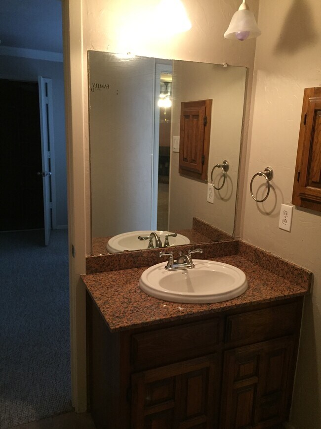 Second bed room granite sink top - 3136 Pin Oak Ct