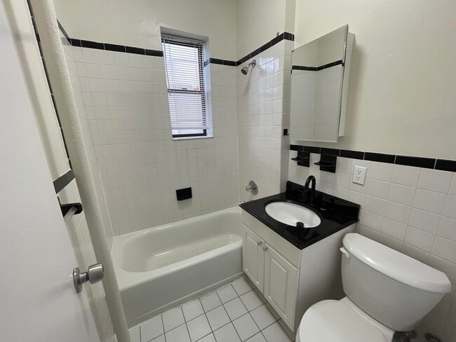 Building Photo - 9015 Bergenwood Ave