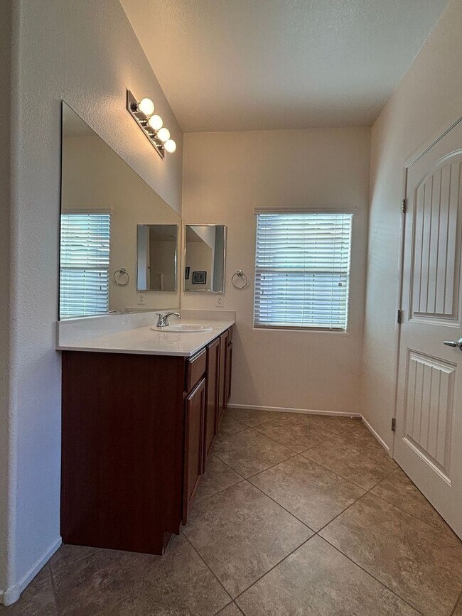 Building Photo - Gated 3-Bedroom Home with Community Pool Near Fort Apache & Blue Diamond