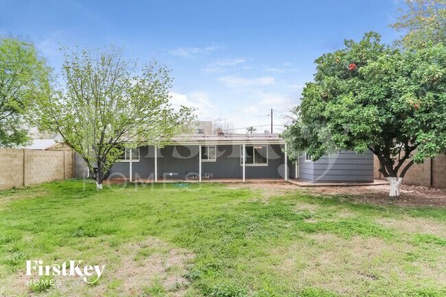 Building Photo - 7744 N 21st Ave