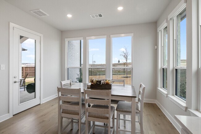 Building Photo - Stunning 4-Bedroom Luxury Residence with Bonus Office in the Prestigious Walsh Community LIKE NEW!