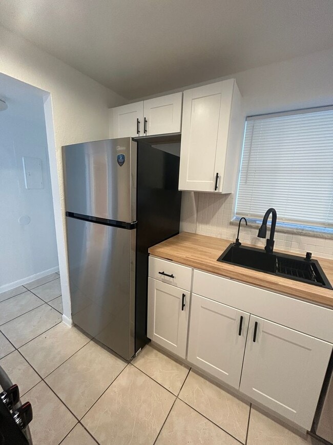 Building Photo - Now Leasing - Two bedroom condo with a pri...