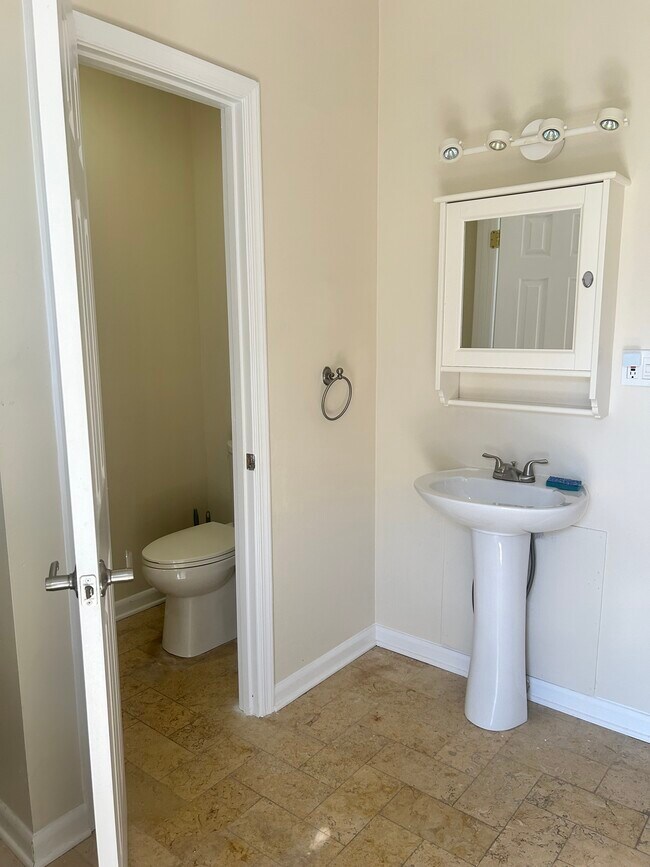 powder room on the main level - 1509 Ramsay St
