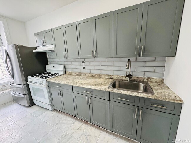 Building Photo - 25-38-38 22nd St