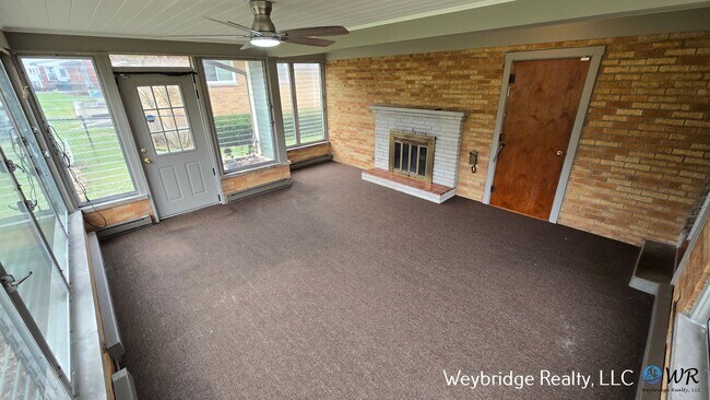 Building Photo - Charming Mid-Century 2BR Home with Sunroom, Fireplace & Fenced Yard