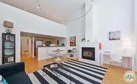 Building Photo - Spacious 1BR|2BA Loft Style Condo in the h...