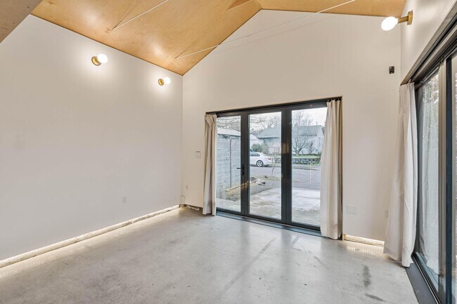Building Photo - Beautiful, modern 4-bdrm/2-bath home in Concordia—Private, urban sanctuary w/ flex spaces