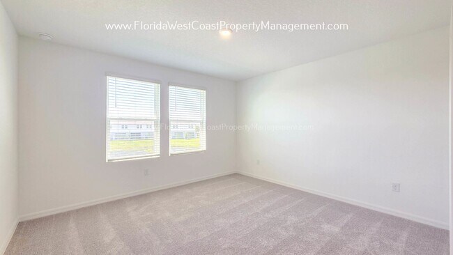 Building Photo - OUTSTANDING BRAND NEW TOWNHOME MOVE IN READY! AZARIO TOWNHOMES LWR !