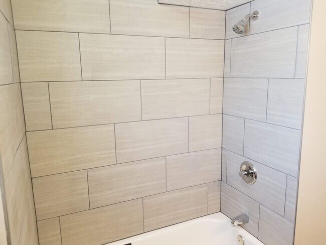 Building Photo - Spacious 5-Bedroom Magna Home with Deck and Ample Parking