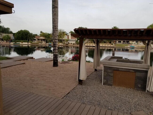 Building Photo - AVAILABLE NOW IN THE SPRINGS ON THE LAKE I...