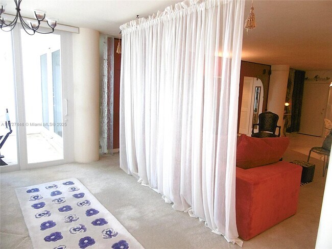 Building Photo - 5005 Collins Ave
