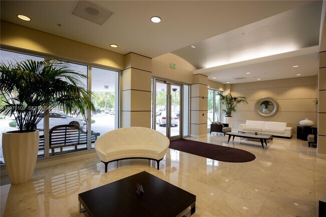 Building Photo - 19380 Collins Ave