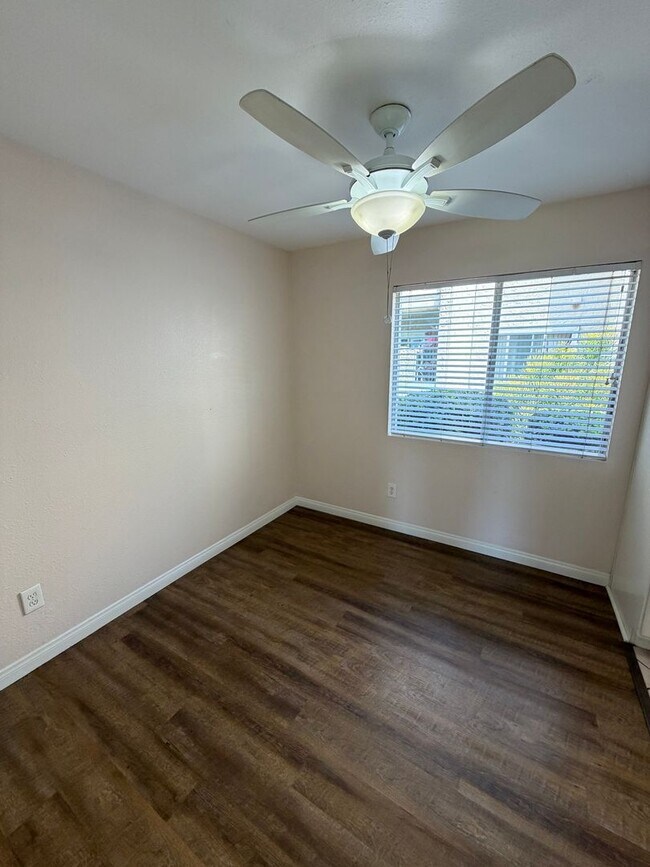 Building Photo - 2BR/1BA Lakeside ground floor condo with 1 car detached garage, 1 uncovered parking space & commu...