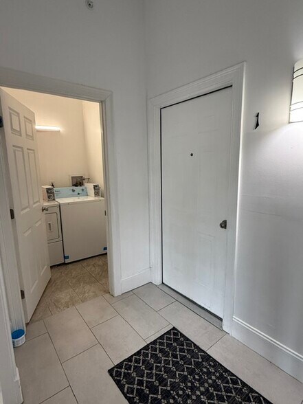 apartment door & laundry - 231 Lake Ave