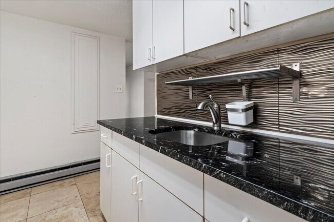 Building Photo - Javid Properties Triplex