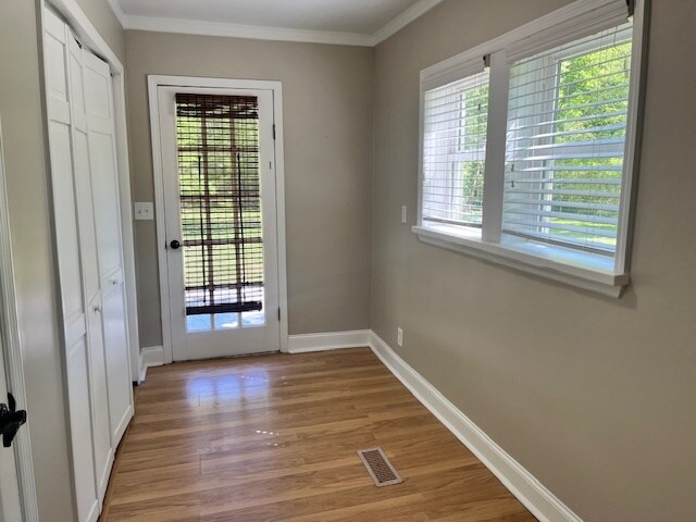 Back hall to patio great for desk - laundry is located here and an additional closet - 4716 McCahill Rd