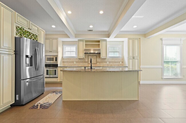 Building Photo - 3 Bedroom Dunham Marsh Beauty with Outdoor Fireplace and Resort-Style Community Amenities
