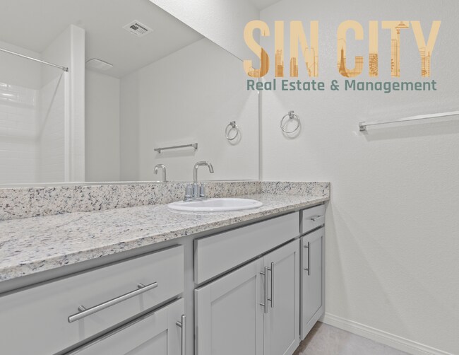 Building Photo - "Charming 4-Bed Home on Love Springs Ln: Spacious 1865 Sq Ft with 2.5 Baths in North Las Vegas!"