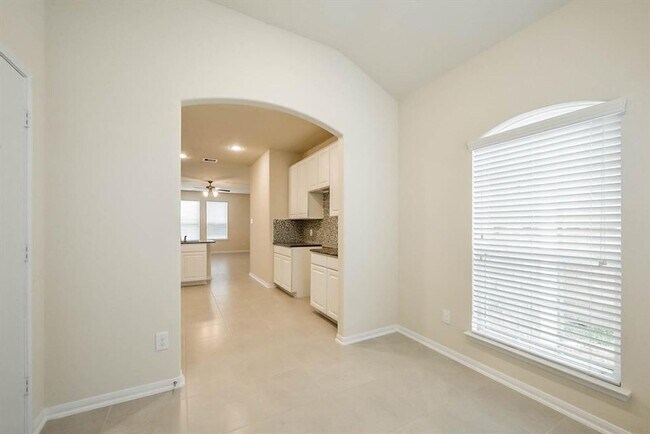 Building Photo - Beautiful stone front 4 bedroom, 3 bath home has bay windows in breakfast nook & master. It is on...
