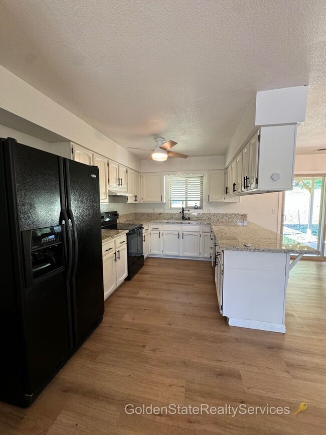 Building Photo - Vacation where you live! Single story home...