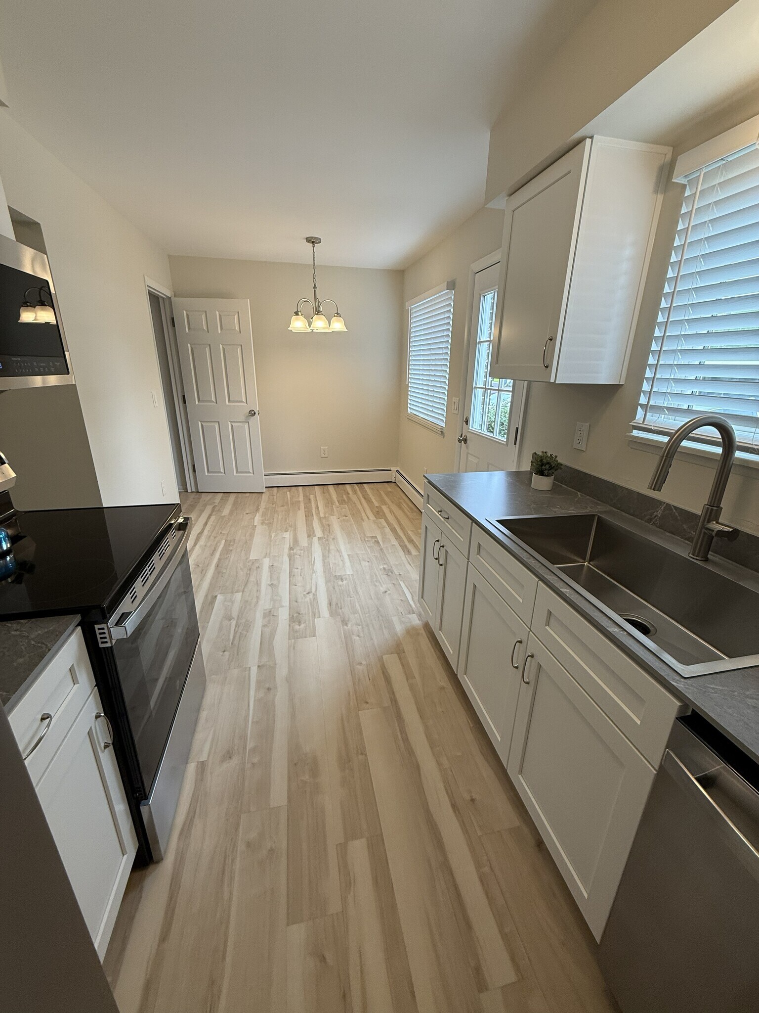 Completely renovated kitchen with brand new stainless steel appliances. - 1133 Tienken Ct