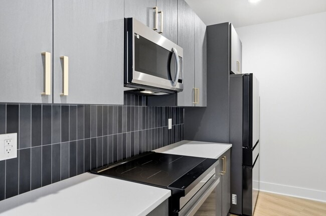 Building Photo - Bright, Open & Exceptionally Large—Your Ideal 2-Story Townhome