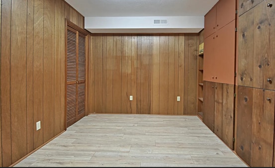 Bedroom with storage cabinets, bookshelves - 7206 Stagecoach Trl